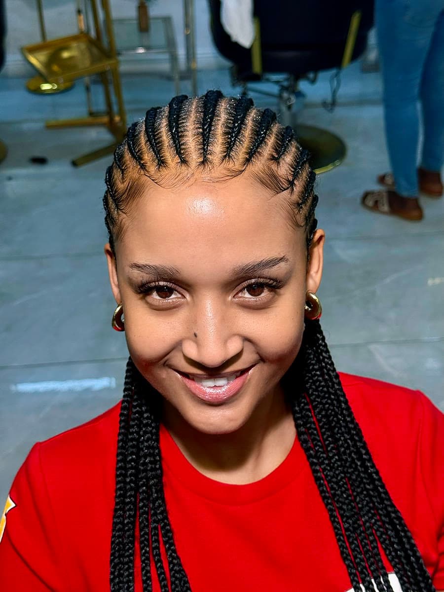 Feed-In Cornrows — Cornrows & feed-in braids at Qasr Alshar Salon, Dubai — crisp, precise lines near Union Metro, Deira.