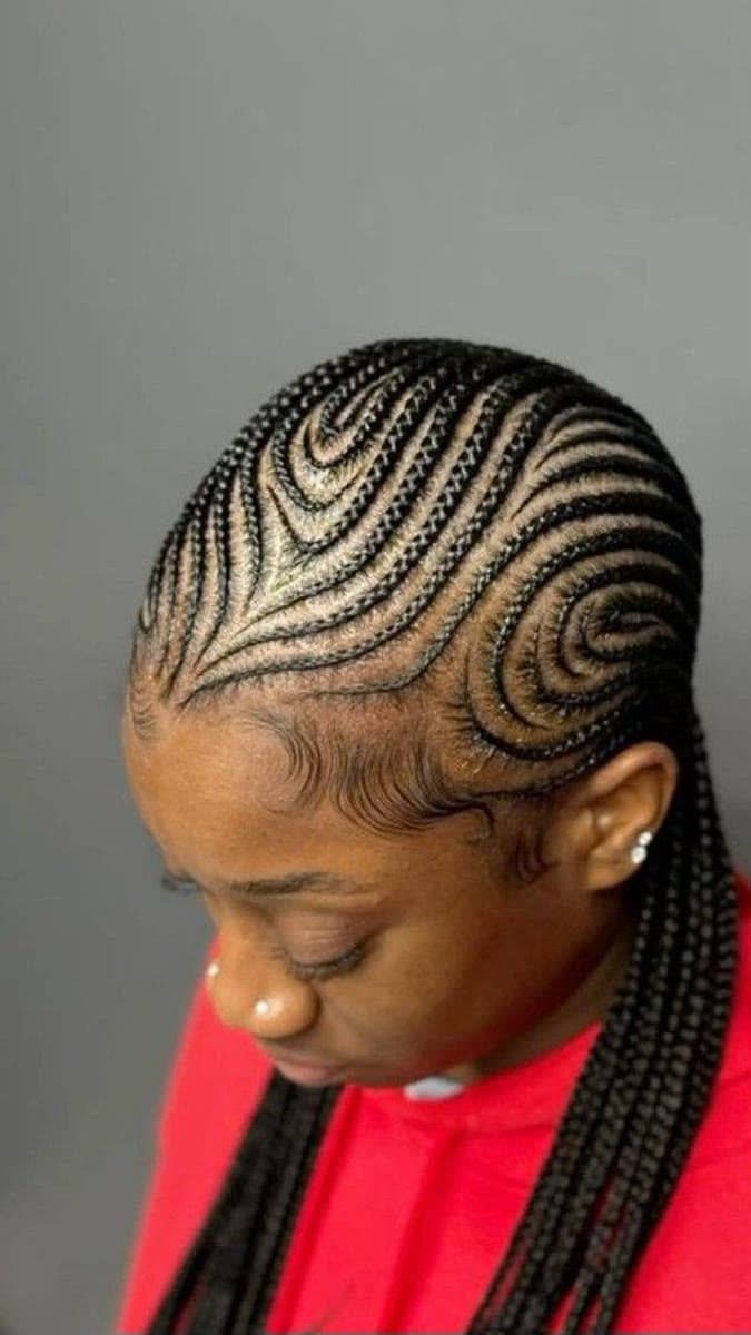 Swirl Cornrows — Cornrows & feed-in braids at Qasr Alshar Salon, Dubai — crisp, precise lines near Union Metro, Deira.