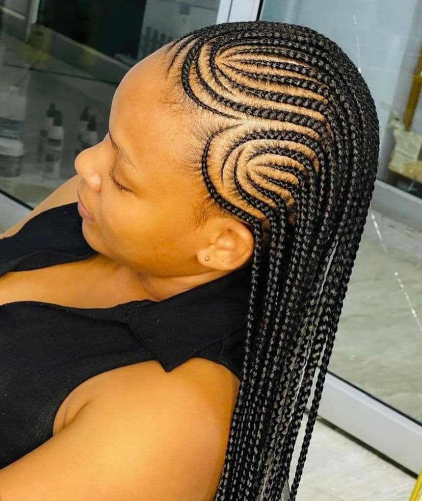 Swirl Feed-In Long Back — Cornrows & feed-in braids at Qasr Alshar Salon, Dubai — crisp, precise lines near Union Metro, Deira.