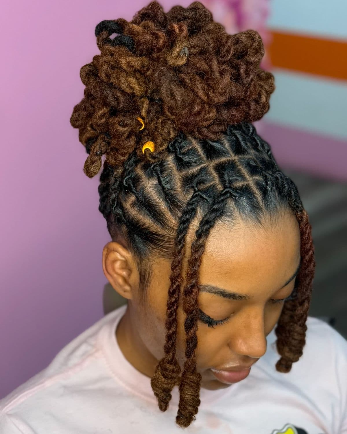 Twisted Locs Updo Brown — Locs, sister locks & dreadlock styling at Qasr Alshar Salon, Dubai — near Union Metro, Deira.
